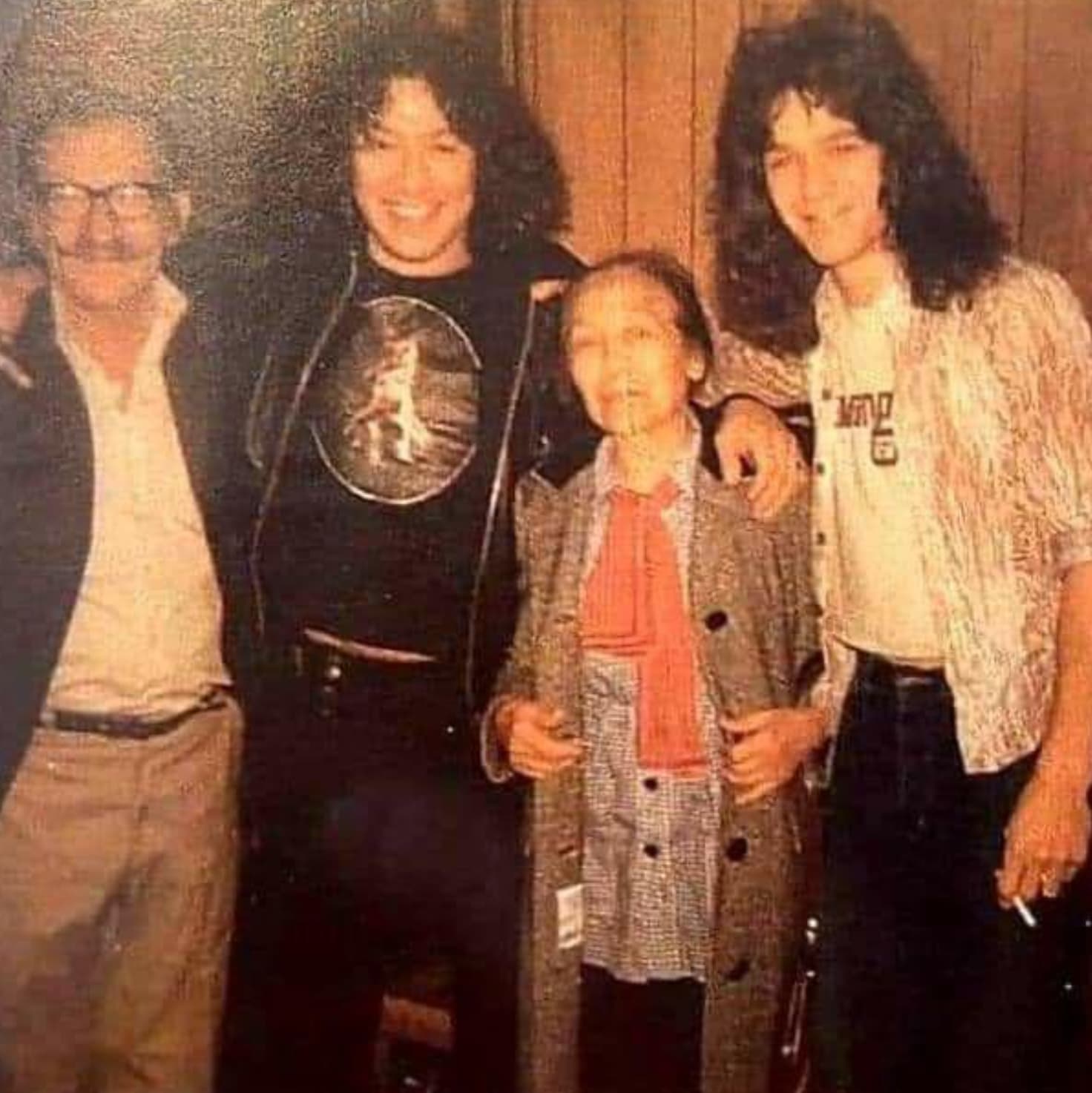 “Alex and Eddie Van Halen with their parents, 1980.” 